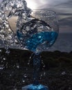 Sunset water splashing wine glass Royalty Free Stock Photo