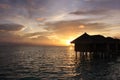 Sunset and water villas, Maldives Royalty Free Stock Photo