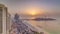 Sunset waterfront overview Jumeirah Beach Residence JBR skyline aerial timelapse with yacht and boats Royalty Free Stock Photo