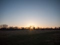 sunset waterlogged country walkway white sky autumn field dedham