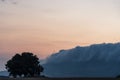 Sunset with wave of clouds effect