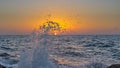 Sunset wave swallows the sea Royalty Free Stock Photo