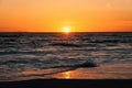 Sunset and waves in Pacific Ocean at Thousand Steps Beach, in Laguna Beach, Orange County, California Royalty Free Stock Photo