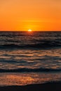 Sunset and waves in Pacific Ocean at Thousand Steps Beach, in Laguna Beach, Orange County, California Royalty Free Stock Photo