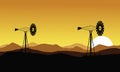 At sunset windmill scenery of silhouettes Royalty Free Stock Photo