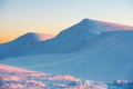 Sunset in winter mountains Royalty Free Stock Photo