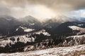 Sunset in winter mountains with dramatic light Royalty Free Stock Photo