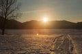 Sunset winter snow nature river horizon landscape. Winter snow forest river sunset view. Sunset winter river snow. Winter sunset Royalty Free Stock Photo