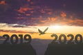 Sunset of 2019 year. digits 2020 against the sky. Goals, plans and tasks for the new year Royalty Free Stock Photo