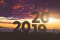 Sunset of 2019 year. digits 2020 against the sky. Goals, plans and tasks for the new year Royalty Free Stock Photo