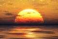 Sunset yellow sun calm yellow sea with sun through nature horizon over the water with a cloudy sky Royalty Free Stock Photo