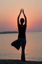 Sunset yoga posture Royalty Free Stock Photo