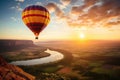 Sunsetlit Hot Air Balloon Floats Above Scenic Landscape With Natural Wonders
