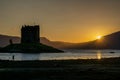 Sunsets over Castle Stalker, Scotland Royalty Free Stock Photo
