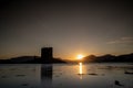 Sunsets over Castle Stalker, Scotland Royalty Free Stock Photo