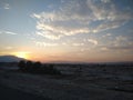 Sunsetting over mountain top and aftermath of severe rain storm in California