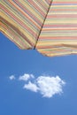 Sunshade against blue summer sky