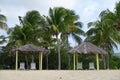 Sunshade Shelters on Sandy Beach Royalty Free Stock Photo