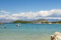 Sunshade umbrellas and deckchairs on the small beautiful Ksamil beach, Albania.