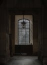 Sunshine Through arched window alcove and lamp to The Louvre courtyards