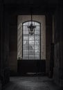 Sunshine Through arched window alcove and lamp to The Louvre courtyards