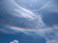 Sunshine clouds sky during morning background. Sky in a morning in Salinas Grandes, Argentina. Bright colors. Clouds and a rainbow Royalty Free Stock Photo
