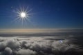 Sunshine directly above the clouds