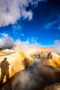 Sunshine huge steaming geyser in Bolivia