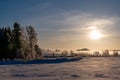 Sunshine over open fields covered in snow Royalty Free Stock Photo