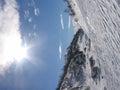 Sunshine over snowy mountains