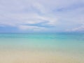 Sunshine on a sea wave at Karon beach, Phuket, Thailand. Sunny summer sea beach waves. Sunshine sea wave near sandy beach.