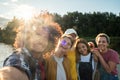 Sunshine Selfie: A Group's Moment of Joy by the Lake