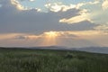 Sunshine At Sunrise Bright Dramatic Sky Above Agricultural Landscape With Flowering Blooming Oilseed Field. Spring Royalty Free Stock Photo