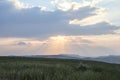 Sunshine At Sunrise Bright Dramatic Sky Above Agricultural Landscape With Flowering Blooming Oilseed Field. Spring Royalty Free Stock Photo