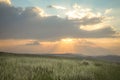 Sunshine At Sunrise Bright Dramatic Sky Above Agricultural Landscape With Flowering Blooming Oilseed Field. Spring Royalty Free Stock Photo