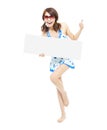 Sunshine woman holding a board and thumb up gesture Royalty Free Stock Photo