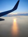 The view seen from inside the plane, looks like the sun is about to set Royalty Free Stock Photo