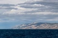 Sunspots on the island of Brac in Croatia from the Adriatic Sea during a cloudy day