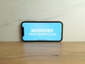Suntory logo displayed on mobile phone