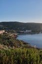 Sunup on calamosca beach from capo sant`Elia lighthouse