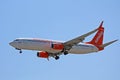 Sunwing Boeing 737-800 Flying Over Royalty Free Stock Photo