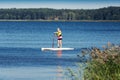 SUP fitness - woman on paddle board in the lake Royalty Free Stock Photo