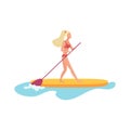 Sup surfer woman standing on paddle board to ride sea or ocean waves Royalty Free Stock Photo