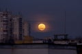 Super Blue Blood Moon January 31, 2018 from Easterm Europe, Bulgaria, Sofia. Lunar Eclipse . The super moon next to building Royalty Free Stock Photo