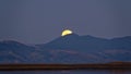 A super blue moon rises over Nelson in New Zealand taken from Motueka