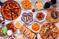 Super Bowl or football theme food table scene, above view on white wood Royalty Free Stock Photo