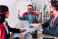 super businessman showing yes gesture to colleagues Royalty Free Stock Photo