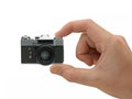 Super compact camera in hand Royalty Free Stock Photo