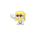 Super cool golden slot machine mascot character wearing black glasses