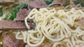 super delicious japanese and korean fusion beef ramen, Bowl of mouth watering Japanese ramen for single serving Royalty Free Stock Photo